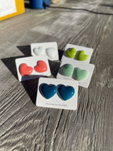 Load image into Gallery viewer, Medium Ceramic Heart Studs On Surgical Steel Posts.
